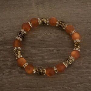Elegant Gold and Orange Beaded Bracelet